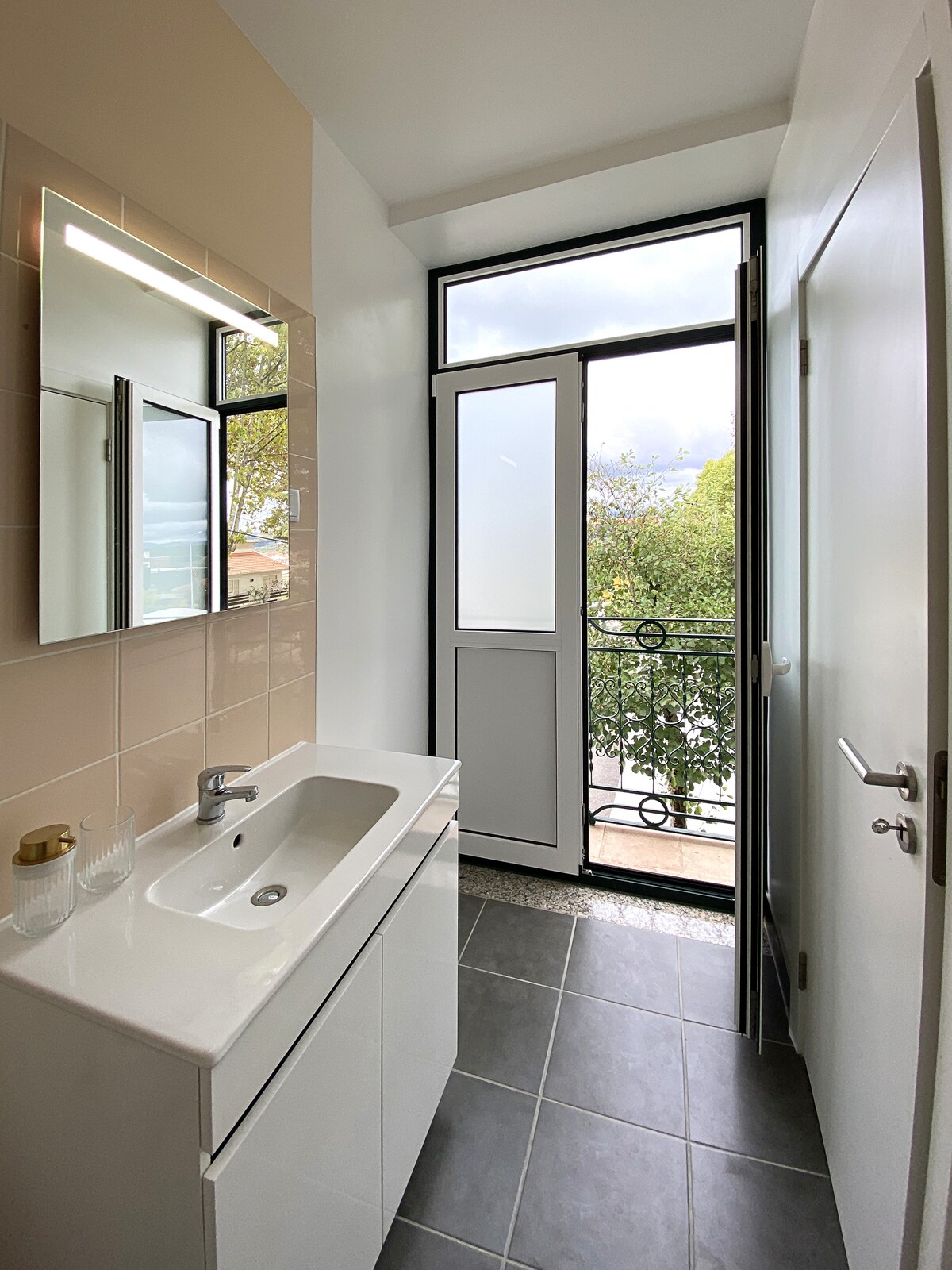Bathroom with balcony door